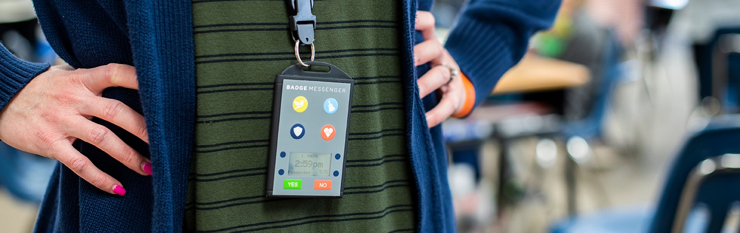 Teacher wearing Badge Messenger